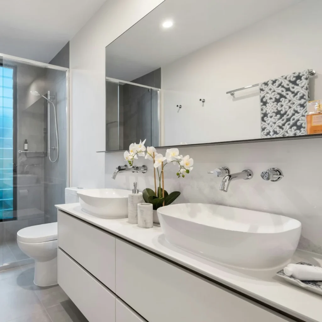 Modern remodeled bathroom with walk-in shower completed by Serna Builders in Rancho Cucamonga, CA