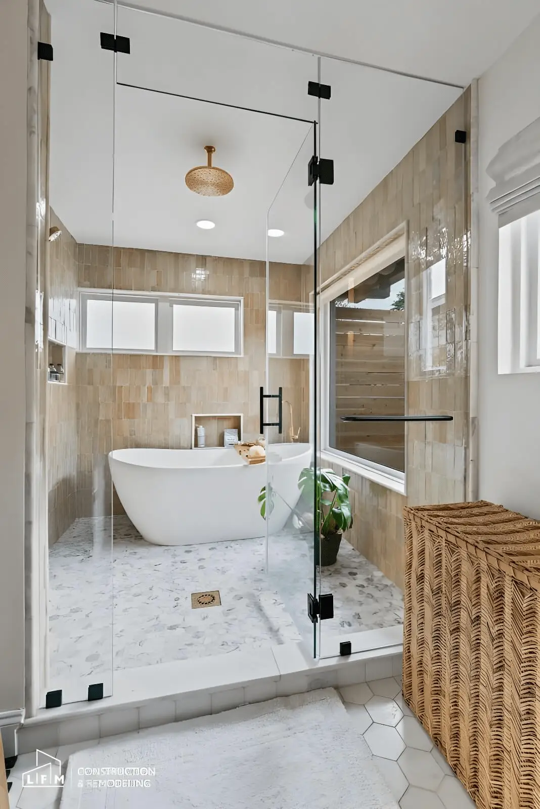 Luxury bathroom renovation with brushed brass fixtures and heated flooring